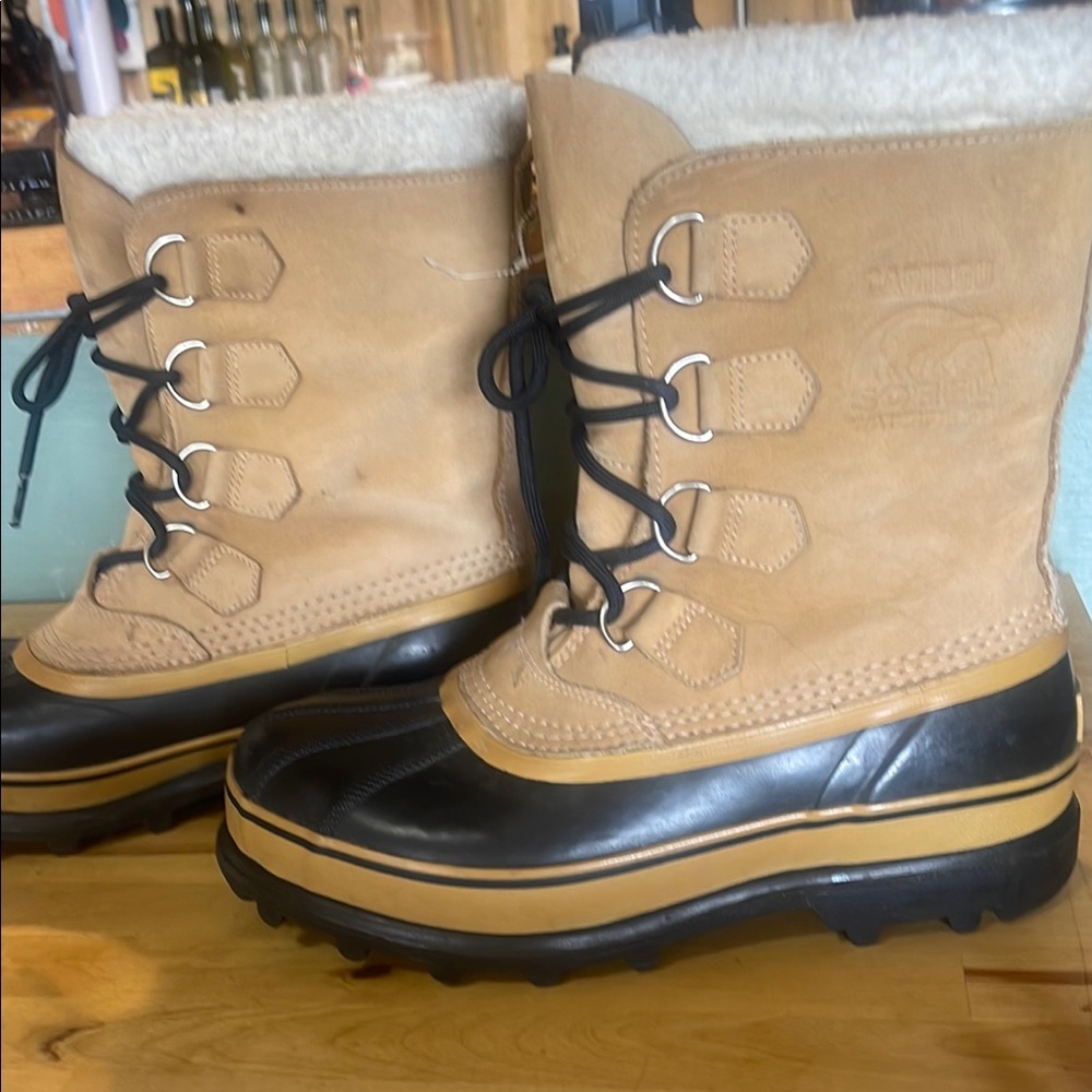 Sorel Tan and Black Lace-Up Boots